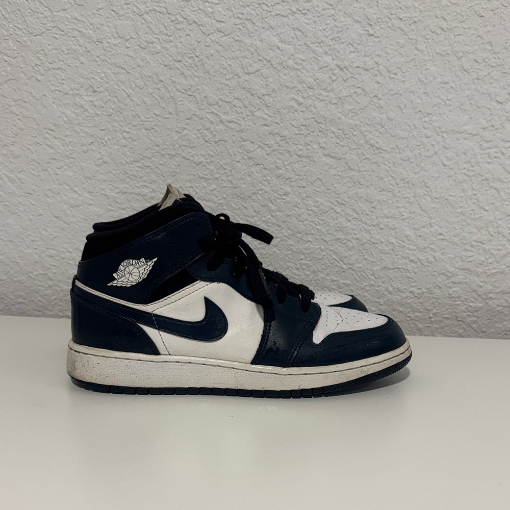 Nike Black and White Mid-Top Sneakers